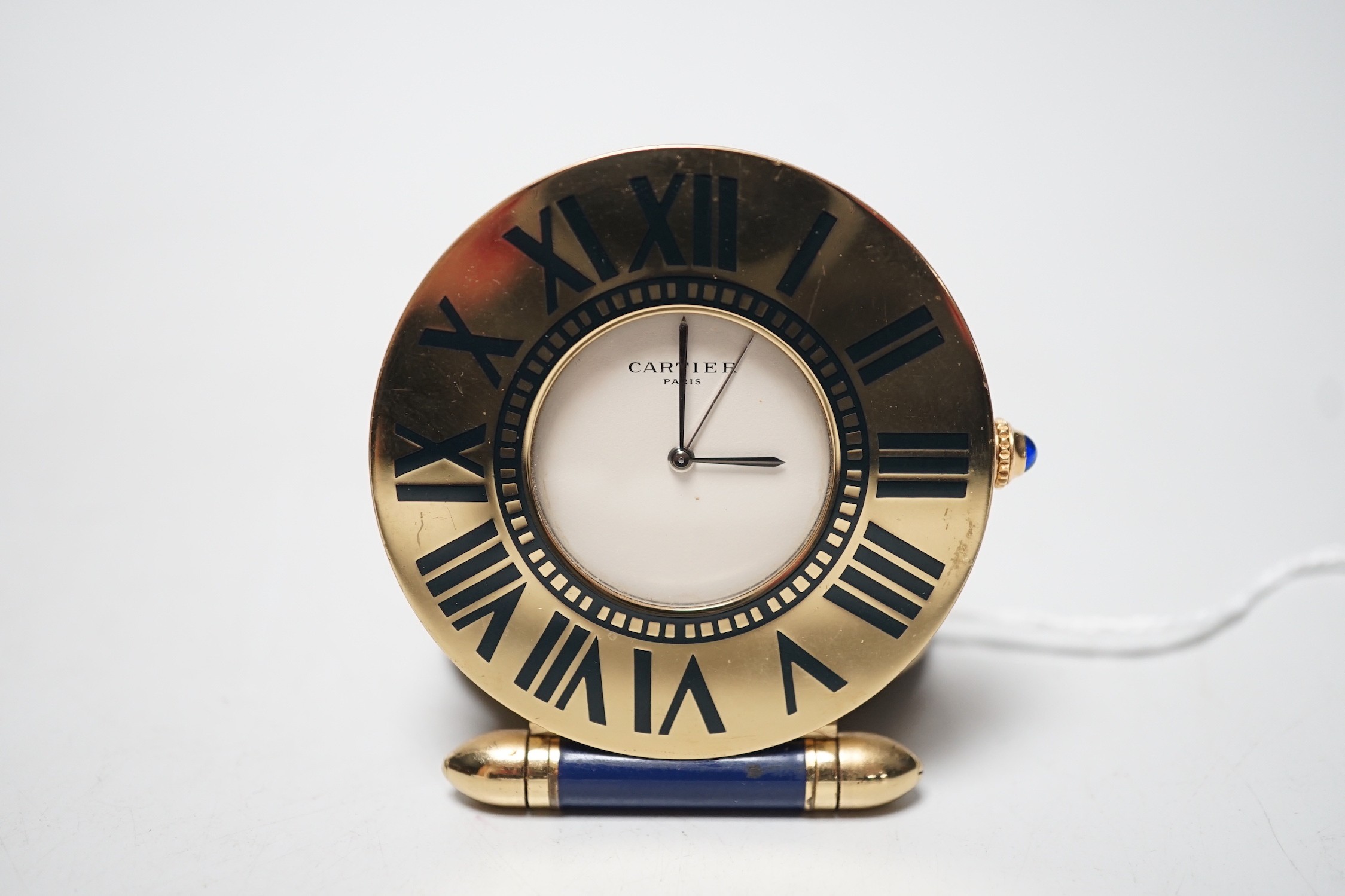 A Cartier travelling alarm timepiece, serial number 357105789
